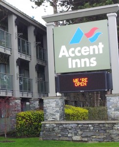 Accent Inn Victoria sign we're open after ABC fire